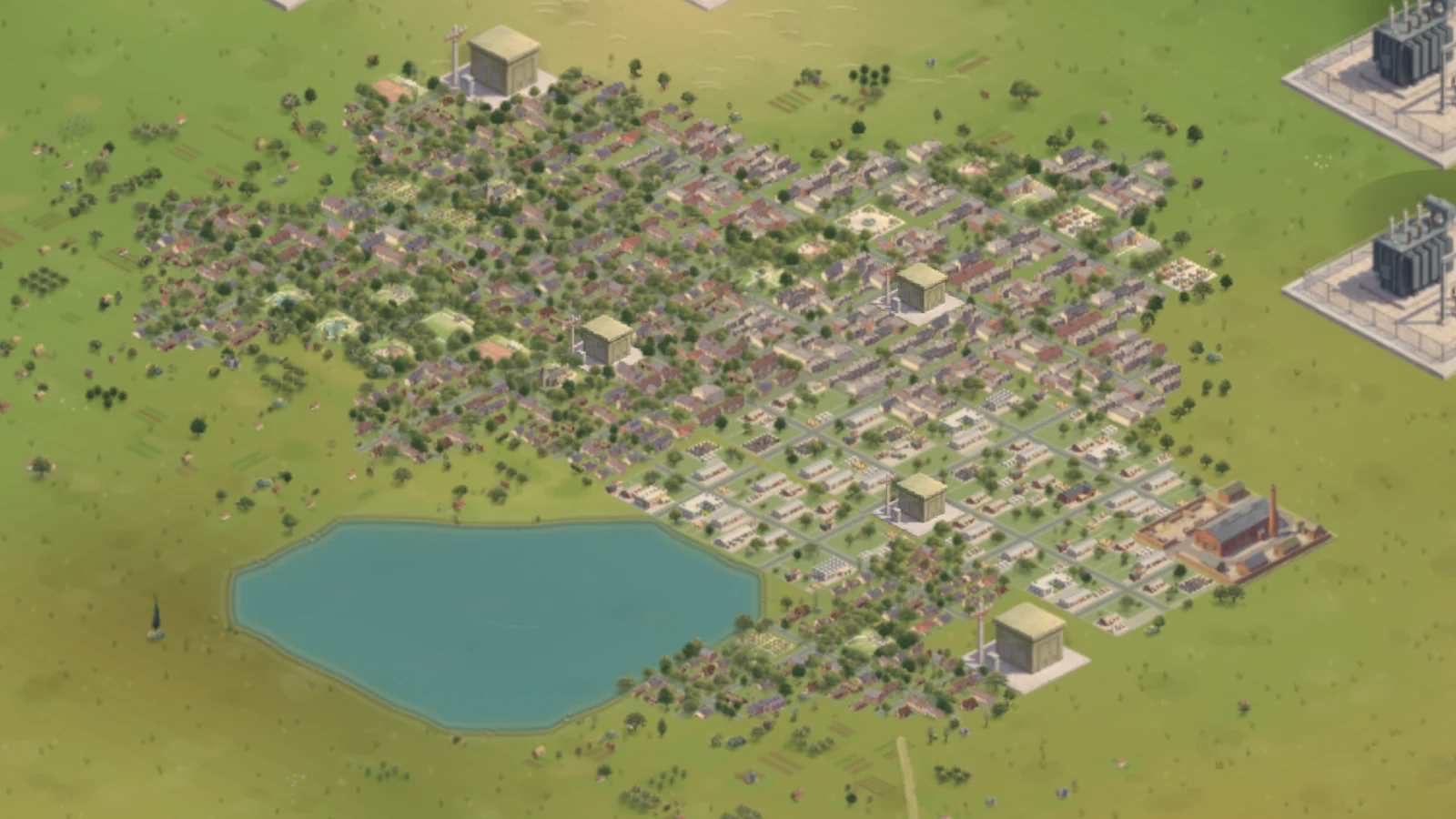 Calder on 0.9.7: houses thinning out into gardens and trees at the town’s edge, beside a lake with a soft bank.